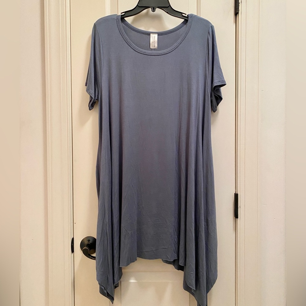 Jersey knit dress local boutique short sleeve shark bite hem bust 22” length 34”